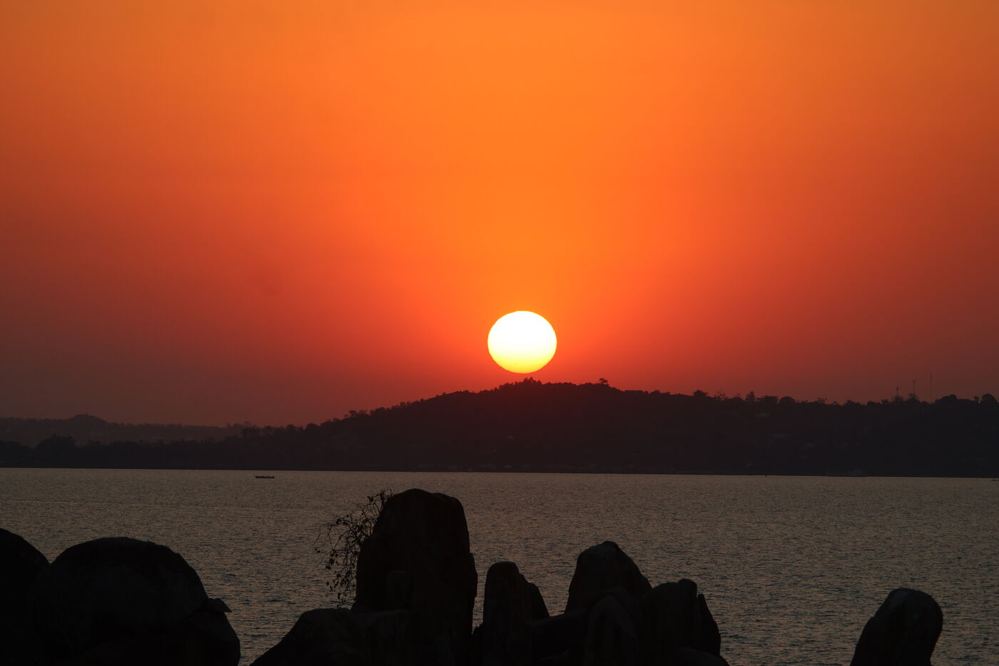 Sun setting over the hills across Lake Victoria, Tanzania